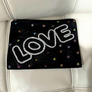 Clutch painted handbag